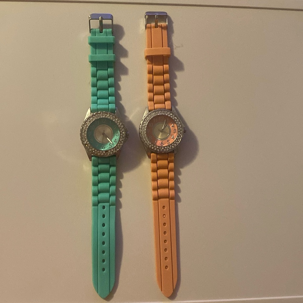 2 watches. Coral and Seagrass. China Movement Stainless Steel back. Need battery